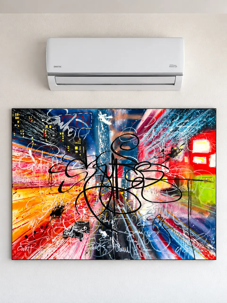 Innengerät einer DIMSTAL Split-Klimaanlage über einem Kunstwerk Bild an einer Wand
